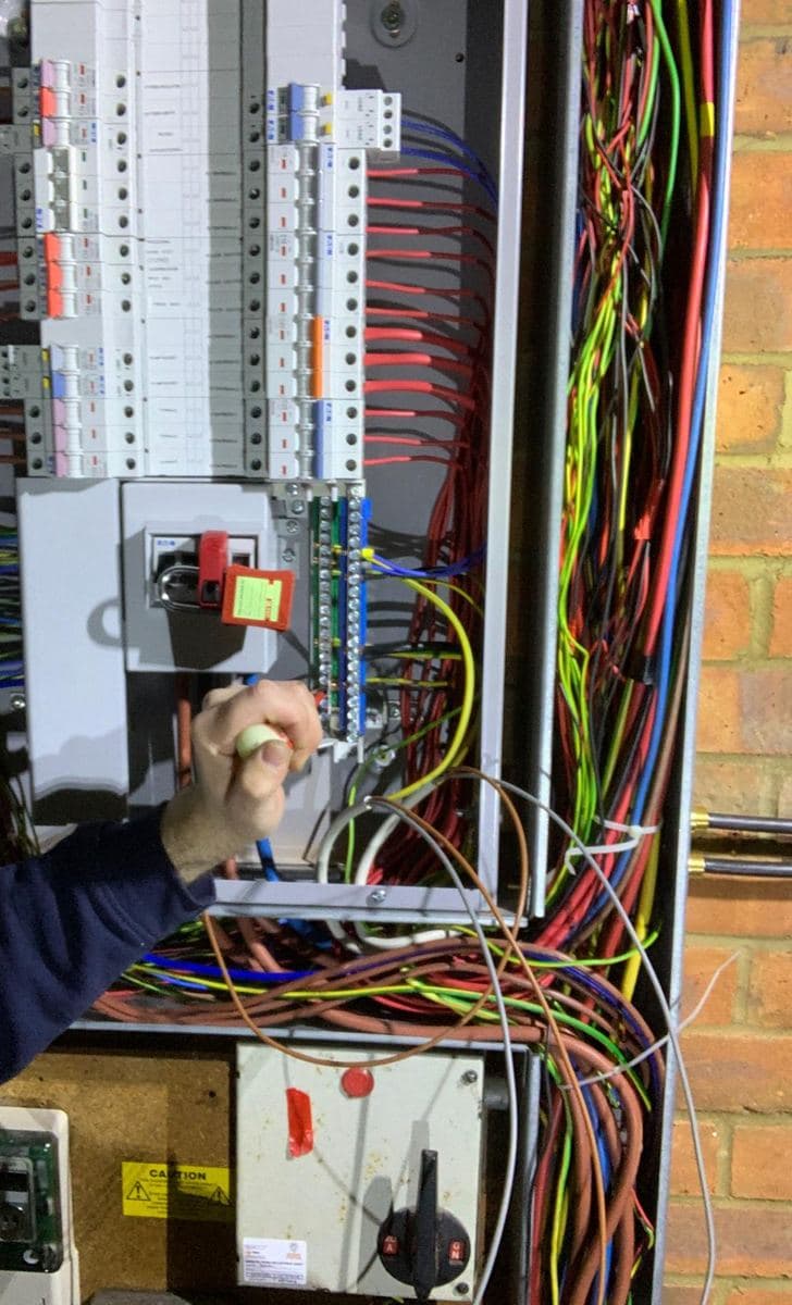 Distribution board with its main switch locked off for safe isolation